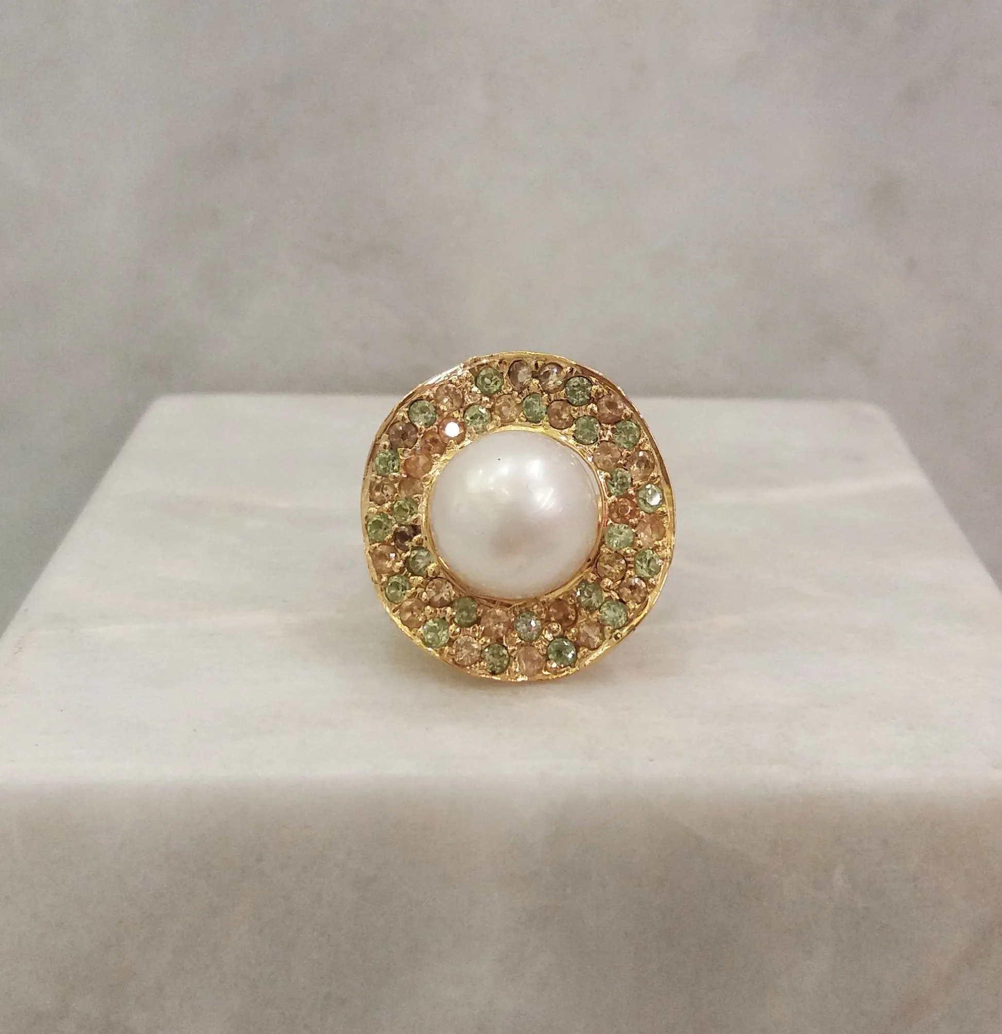 White South Sea Pearl with a pave of Peridots, Citrines & White Zircons Cocktail Ring